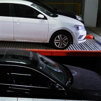 Système de stationnement puzzle peu encombrant avec fosses